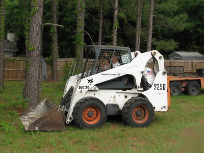2004 bobcat s-250 turbo diesel S250 skid steer + bucket