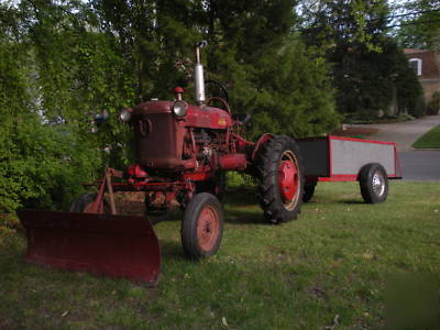 1950 farmall cub tractor with accessories
