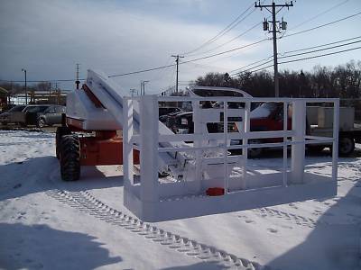 2004 snorkel TB60 4X4 boomlift dual fuel 110 generator